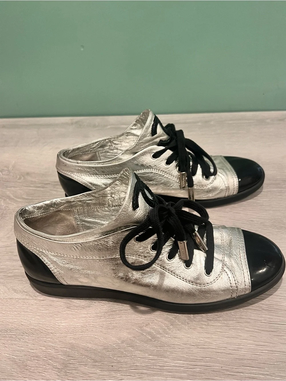 CHANEL Silver and Black Low-Top Lace-Up Sneaker